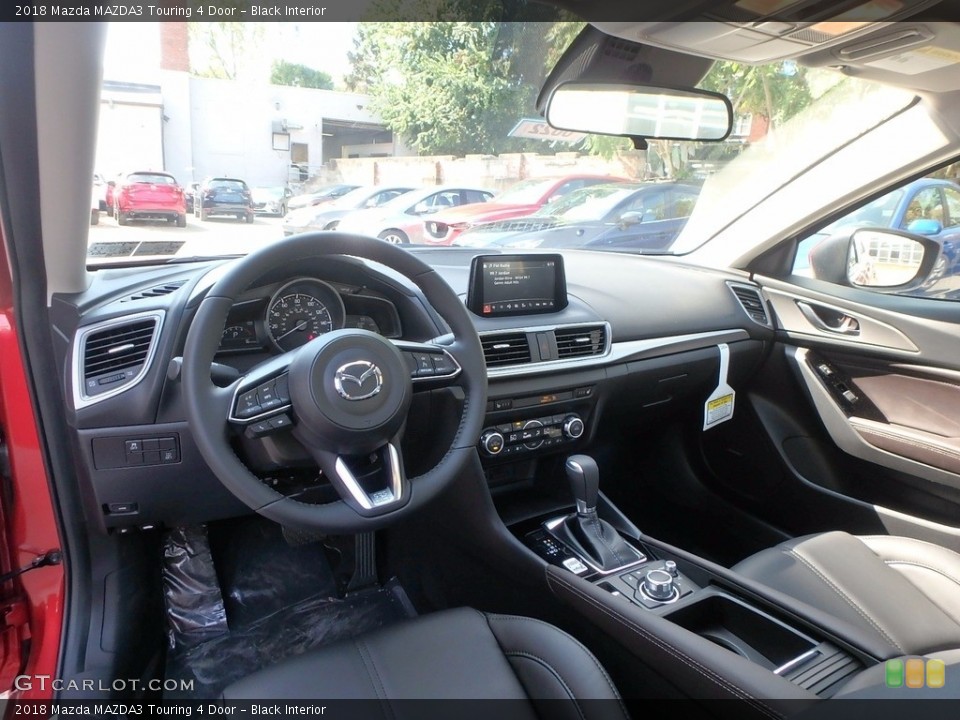 Black Interior Photo for the 2018 Mazda MAZDA3 Touring 4 Door #122986956