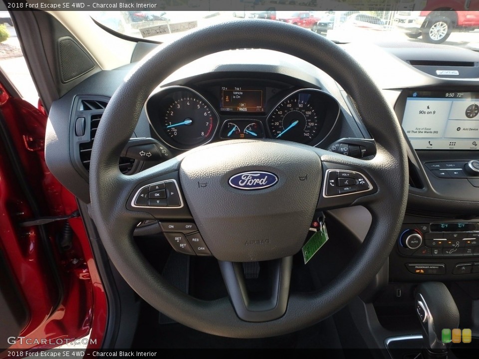 Charcoal Black Interior Steering Wheel for the 2018 Ford Escape SE 4WD #122997858