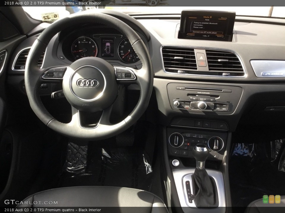 Black Interior Dashboard for the 2018 Audi Q3 2.0 TFSI Premium quattro #123166416