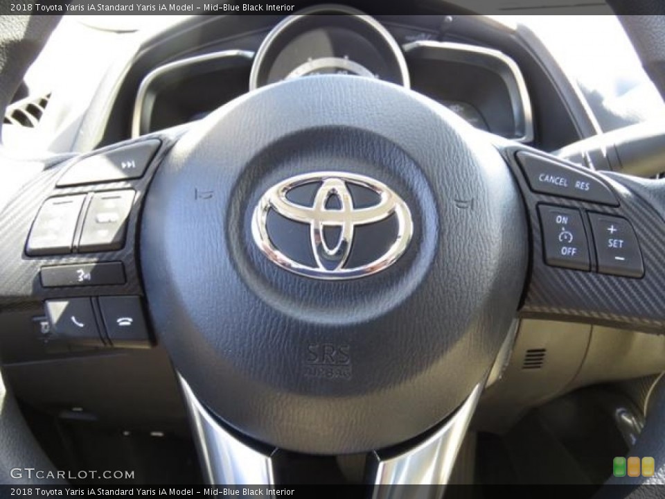 Mid-Blue Black Interior Controls for the 2018 Toyota Yaris iA  #123195411