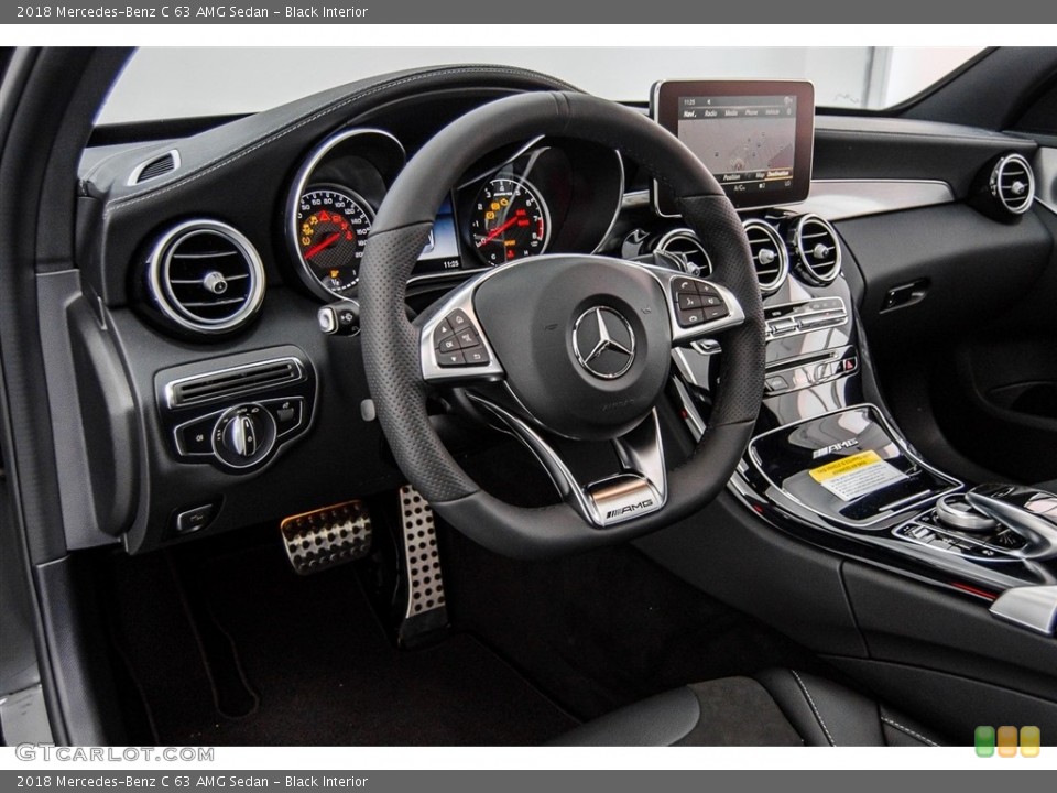 Black Interior Dashboard for the 2018 Mercedes-Benz C 63 AMG Sedan #123270450