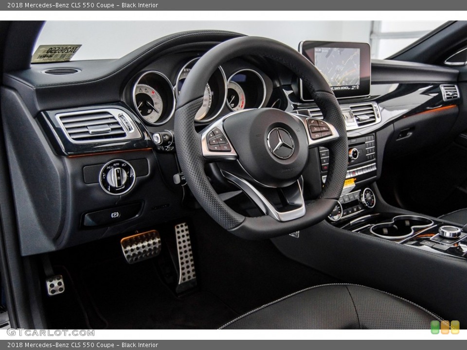 Black Interior Dashboard for the 2018 Mercedes-Benz CLS 550 Coupe #123349916