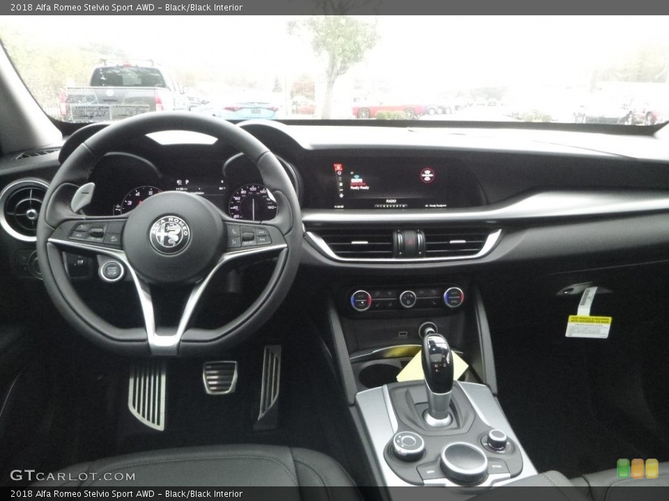 Black/Black Interior Dashboard for the 2018 Alfa Romeo Stelvio Sport AWD #123458180
