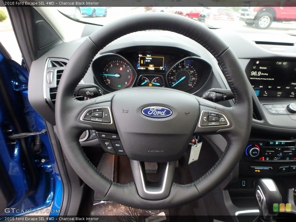 Charcoal Black Interior Steering Wheel for the 2018 Ford Escape SEL 4WD #123506478
