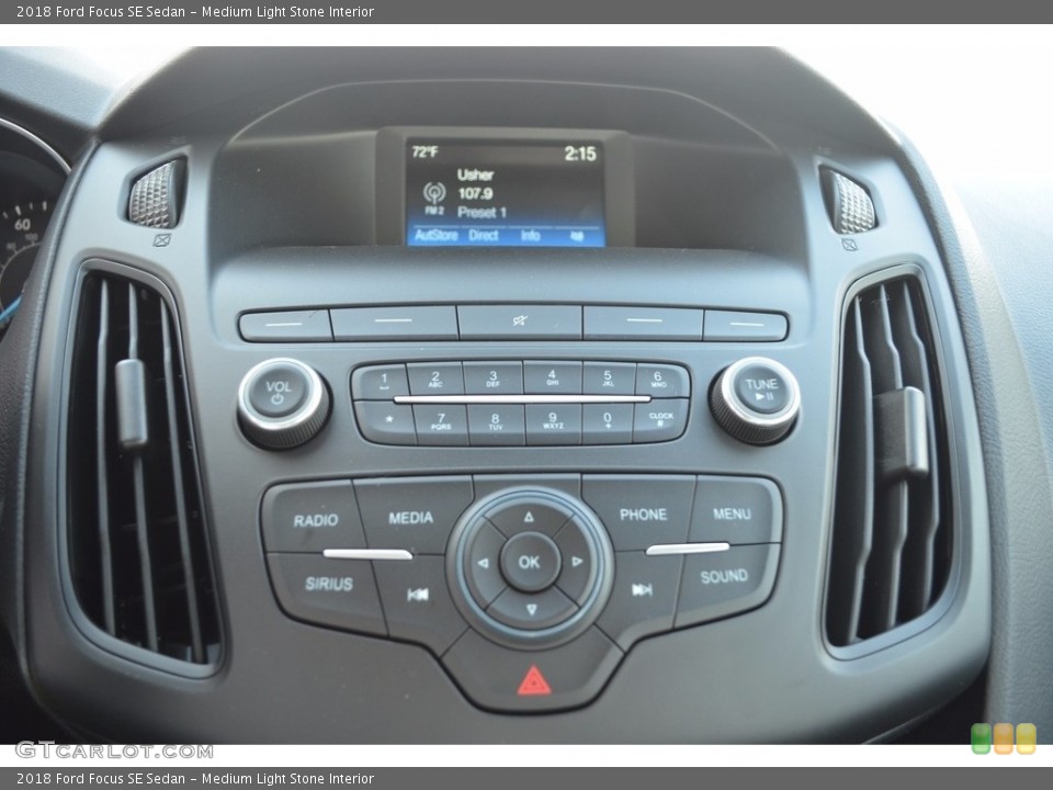 Medium Light Stone Interior Controls for the 2018 Ford Focus SE Sedan #123652588