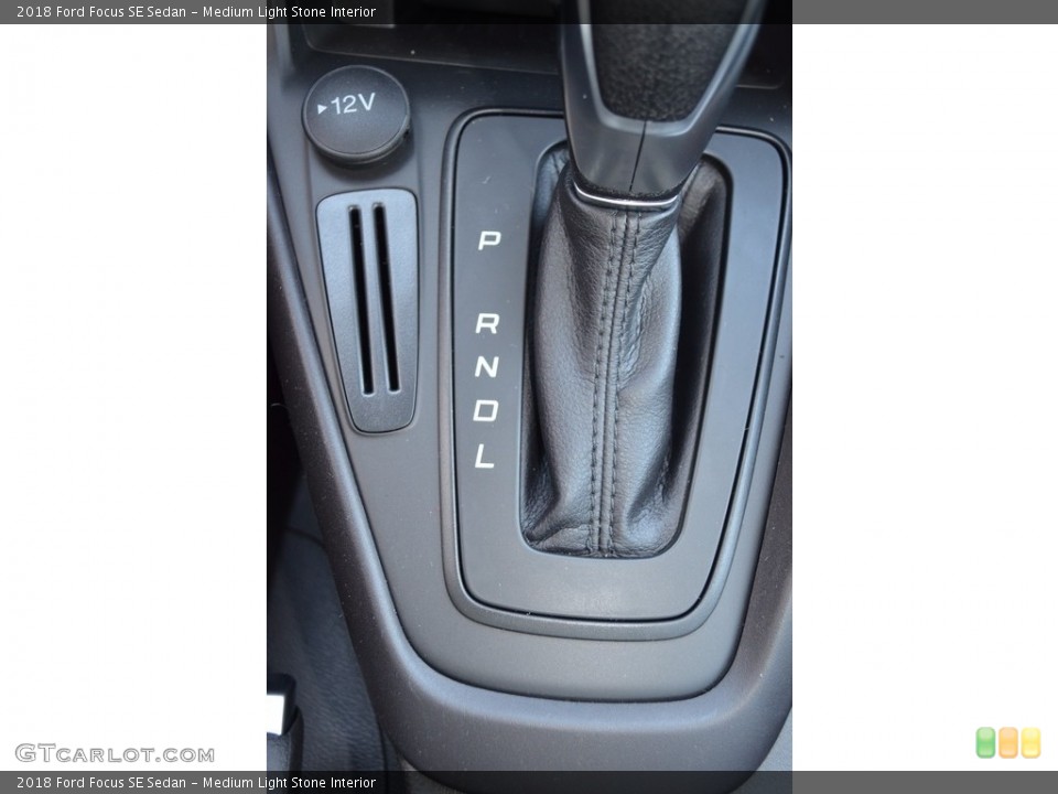 Medium Light Stone Interior Transmission for the 2018 Ford Focus SE Sedan #123652669