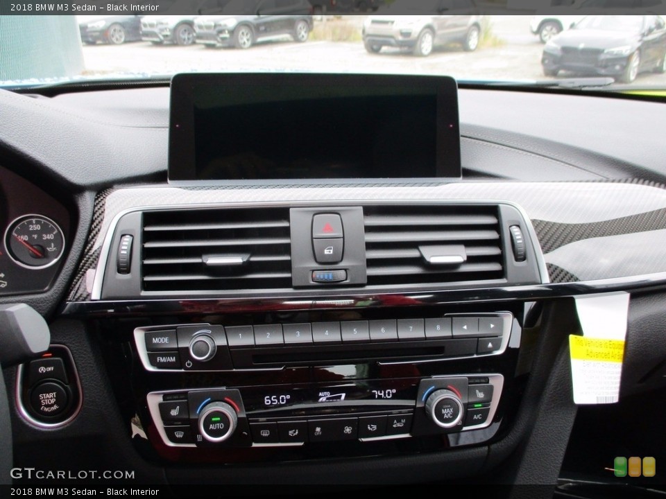 Black Interior Controls for the 2018 BMW M3 Sedan #123669146