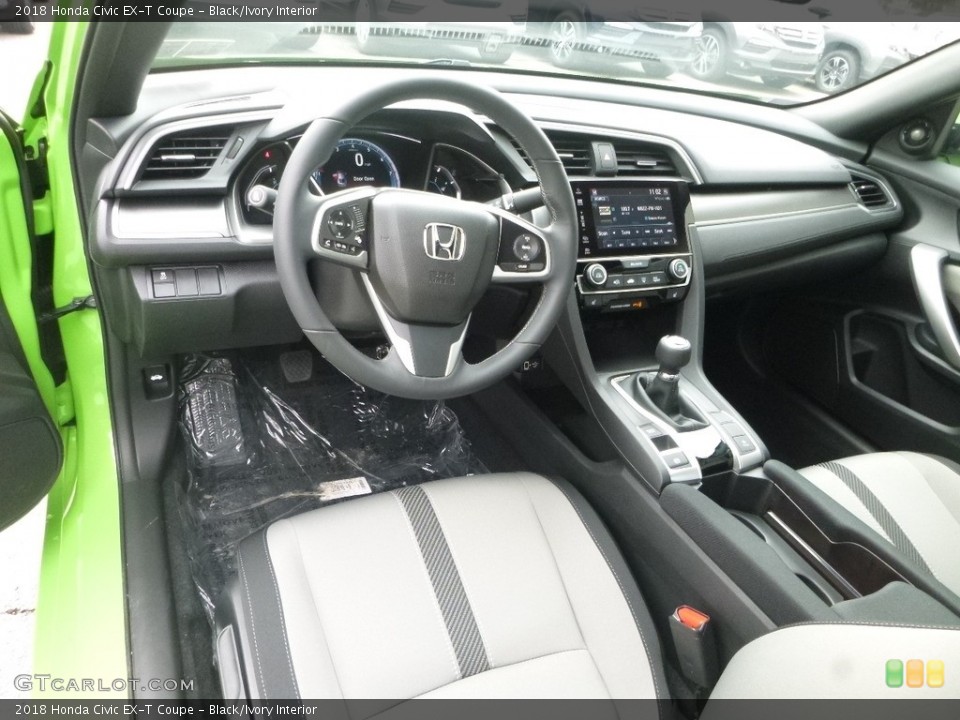 Black/Ivory Interior Photo for the 2018 Honda Civic EX-T Coupe #123712365