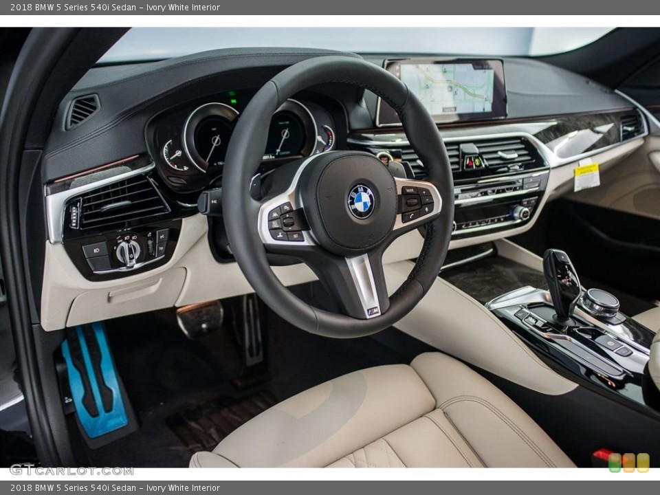 Ivory White 2018 BMW 5 Series Interiors