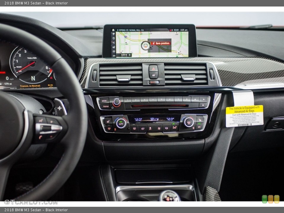 Black Interior Controls for the 2018 BMW M3 Sedan #123743411
