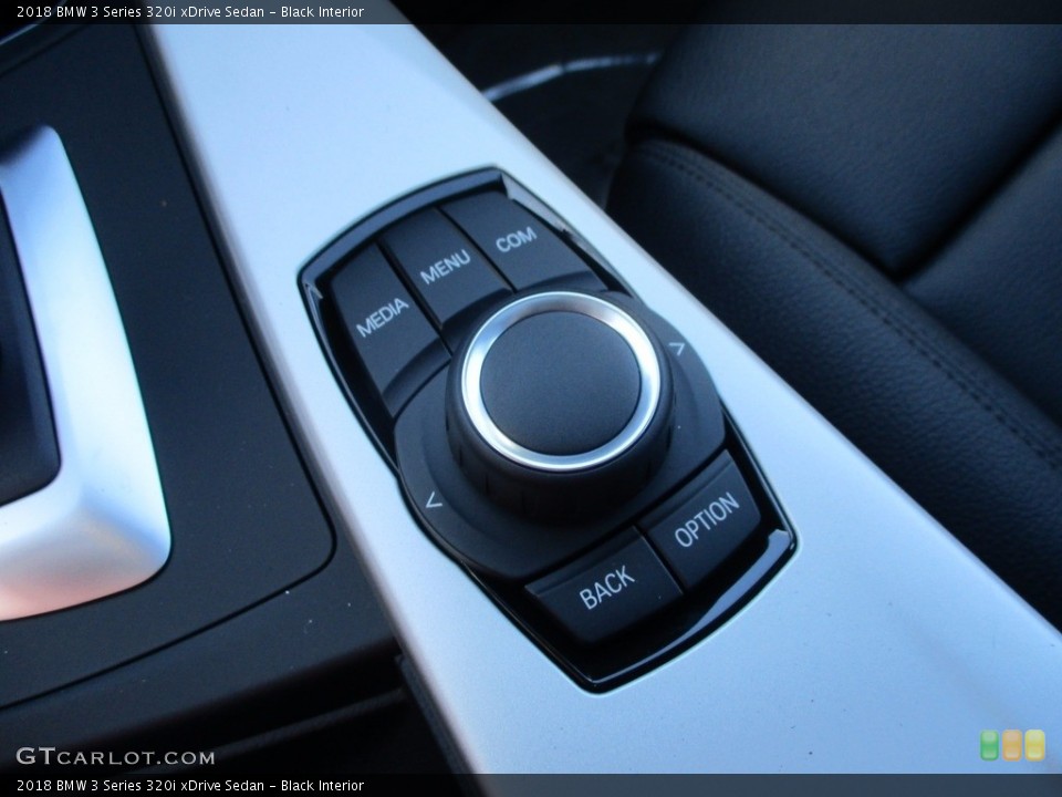 Black Interior Controls for the 2018 BMW 3 Series 320i xDrive Sedan #123798219