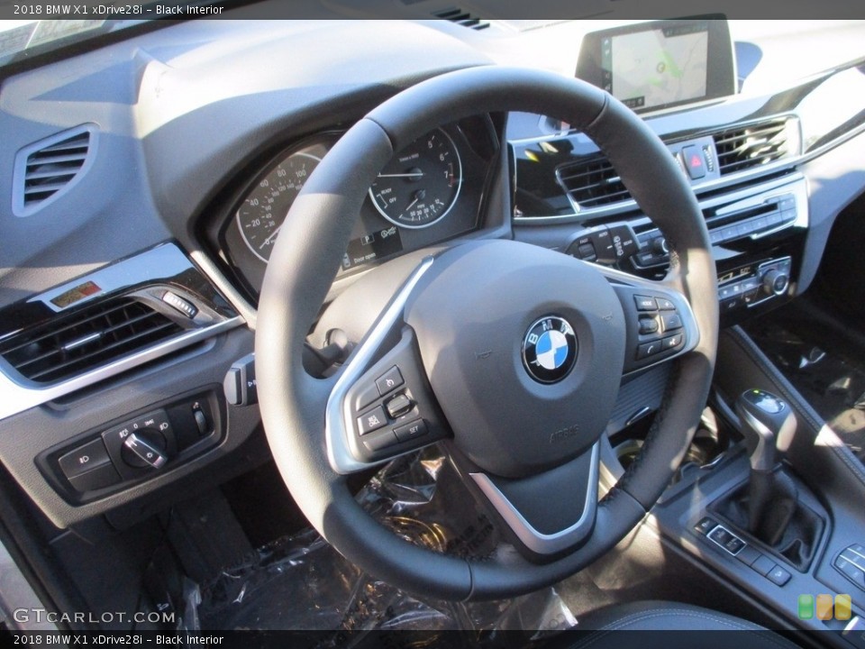 Black Interior Steering Wheel for the 2018 BMW X1 xDrive28i #123802557