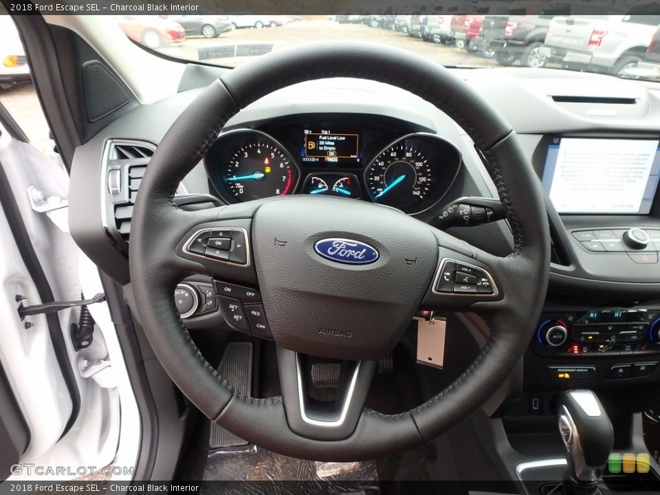 Charcoal Black Interior Steering Wheel for the 2018 Ford Escape SEL #123894757