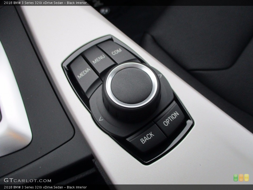 Black Interior Controls for the 2018 BMW 3 Series 320i xDrive Sedan #123931189
