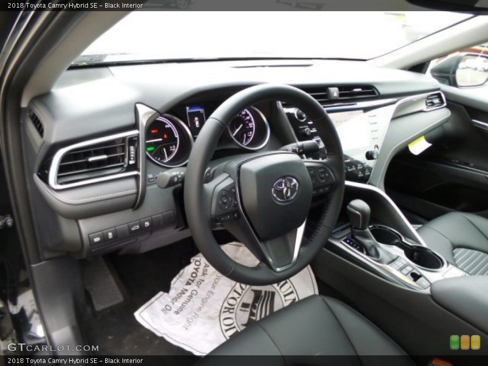 Black Interior Dashboard for the 2018 Toyota Camry Hybrid SE #123959979