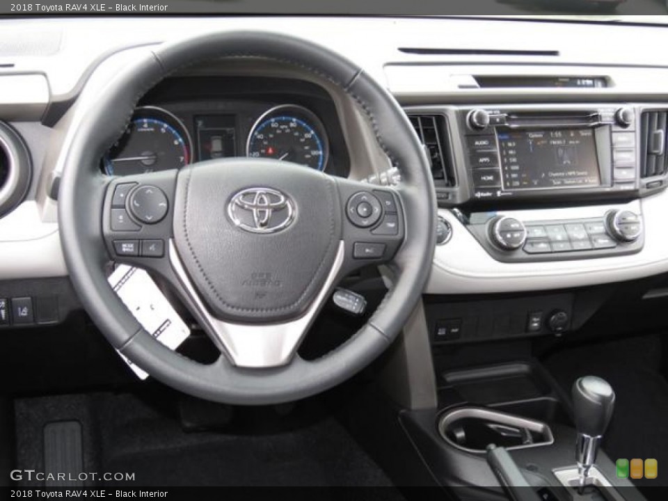 Black Interior Dashboard for the 2018 Toyota RAV4 XLE #124050613