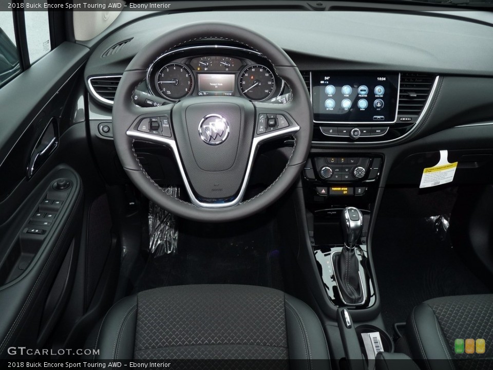 Ebony Interior Dashboard for the 2018 Buick Encore Sport Touring AWD #124264539