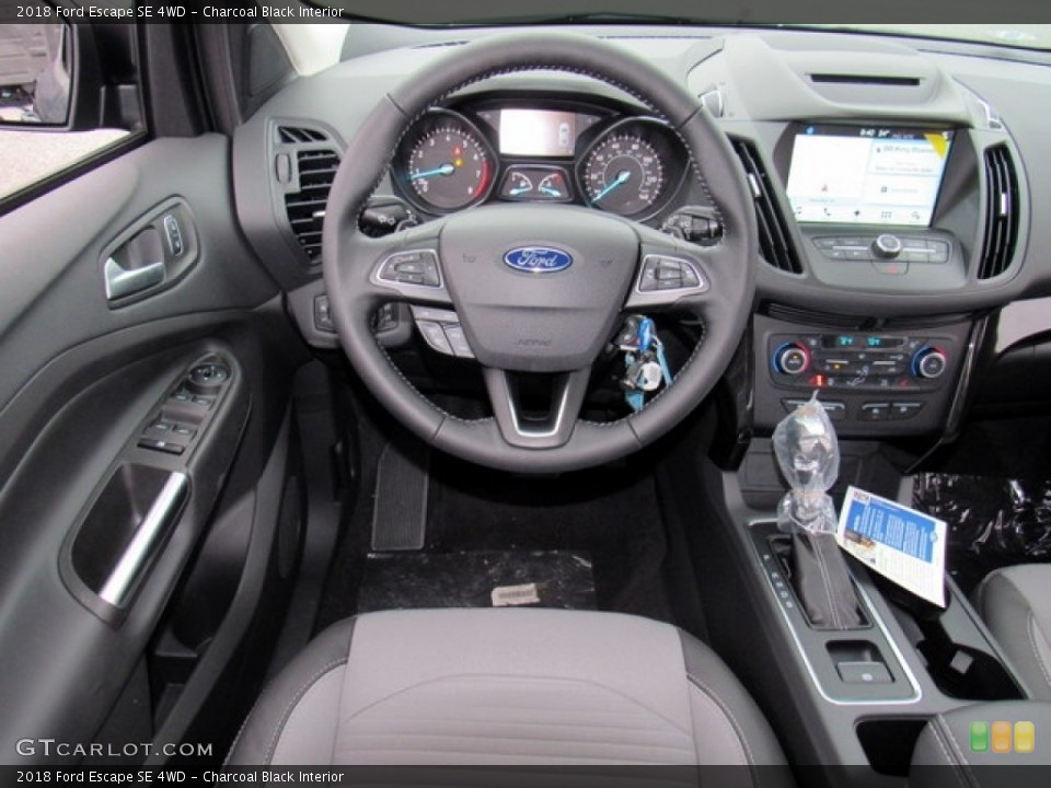 Charcoal Black Interior Dashboard for the 2018 Ford Escape SE 4WD #124301349