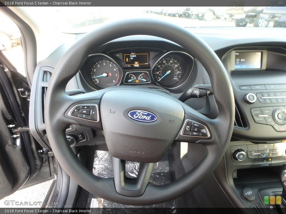 Charcoal Black Interior Steering Wheel for the 2018 Ford Focus S Sedan #124321658
