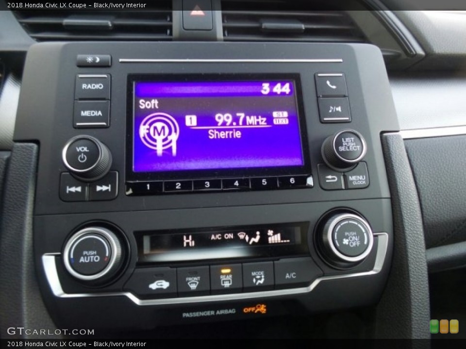 Black/Ivory Interior Controls for the 2018 Honda Civic LX Coupe #124690932