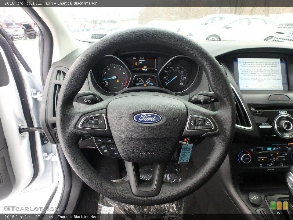 Charcoal Black Interior Steering Wheel for the 2018 Ford Focus SEL Hatch #124692672