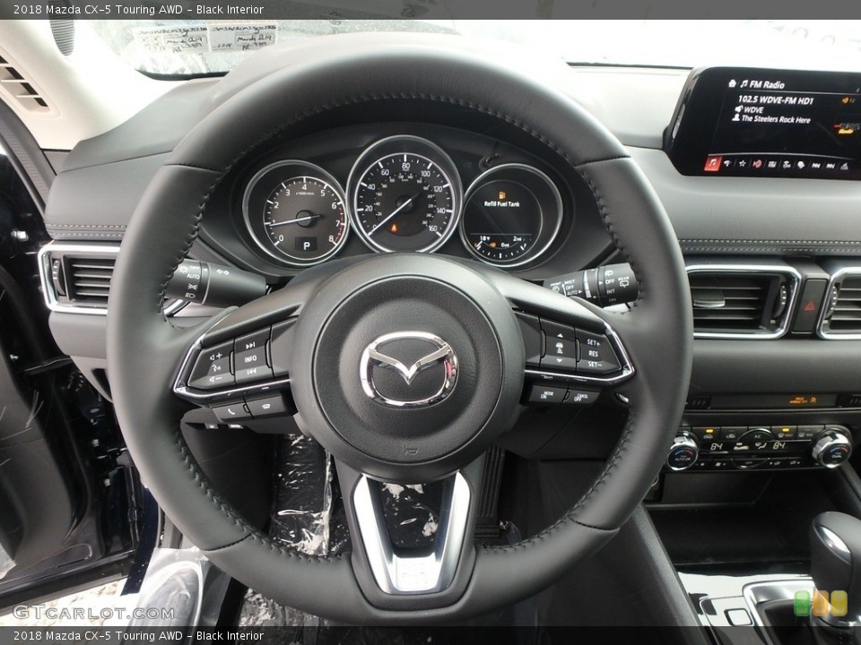 Black Interior Steering Wheel for the 2018 Mazda CX-5 Touring AWD #124717240