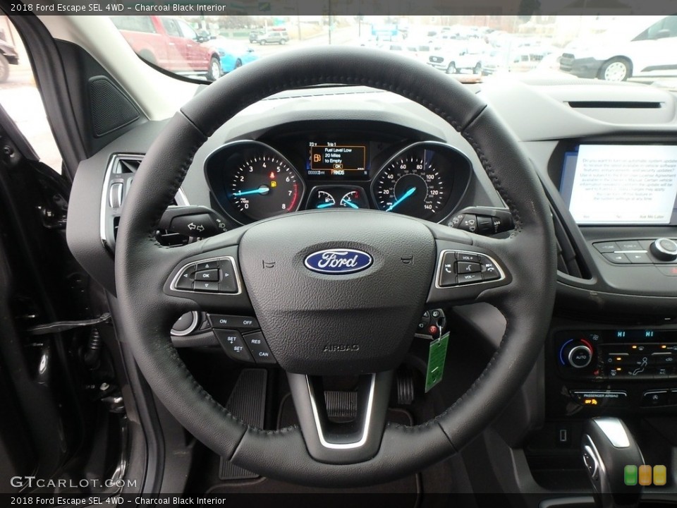 Charcoal Black Interior Steering Wheel for the 2018 Ford Escape SEL 4WD #124825597