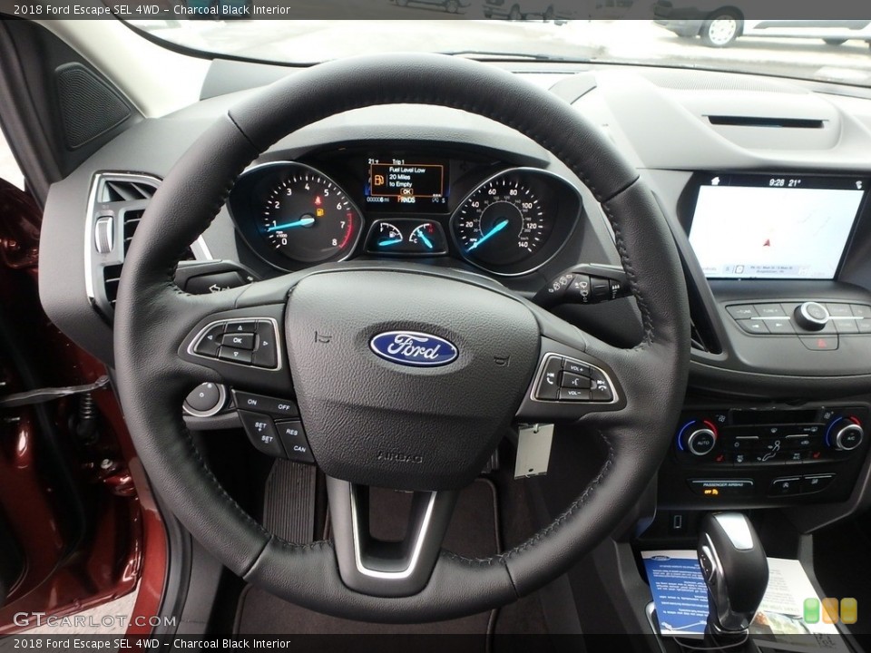 Charcoal Black Interior Steering Wheel for the 2018 Ford Escape SEL 4WD #124827031