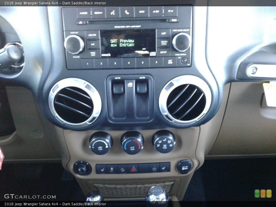 Dark Saddle/Black Interior Controls for the 2018 Jeep Wrangler Sahara 4x4 #124979268