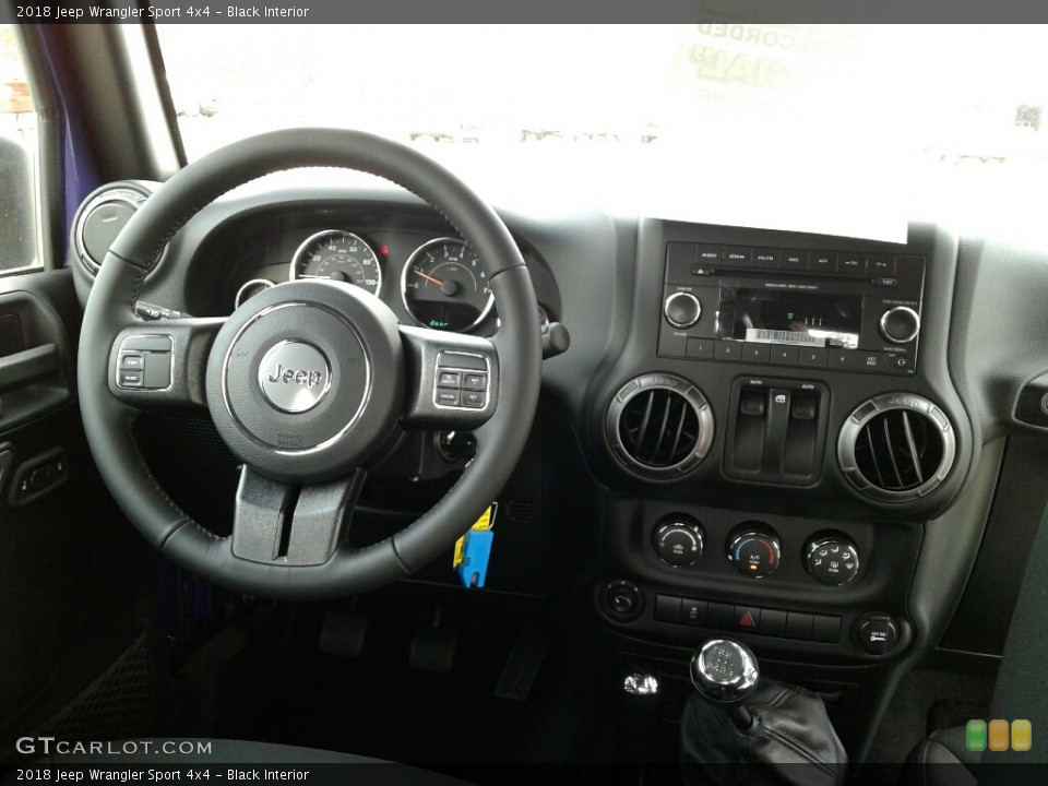 Black Interior Dashboard for the 2018 Jeep Wrangler Sport 4x4 #125371438