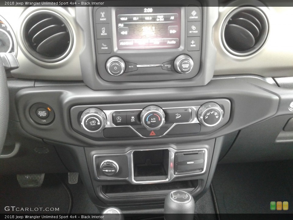Black Interior Controls for the 2018 Jeep Wrangler Unlimited Sport 4x4 #125474472