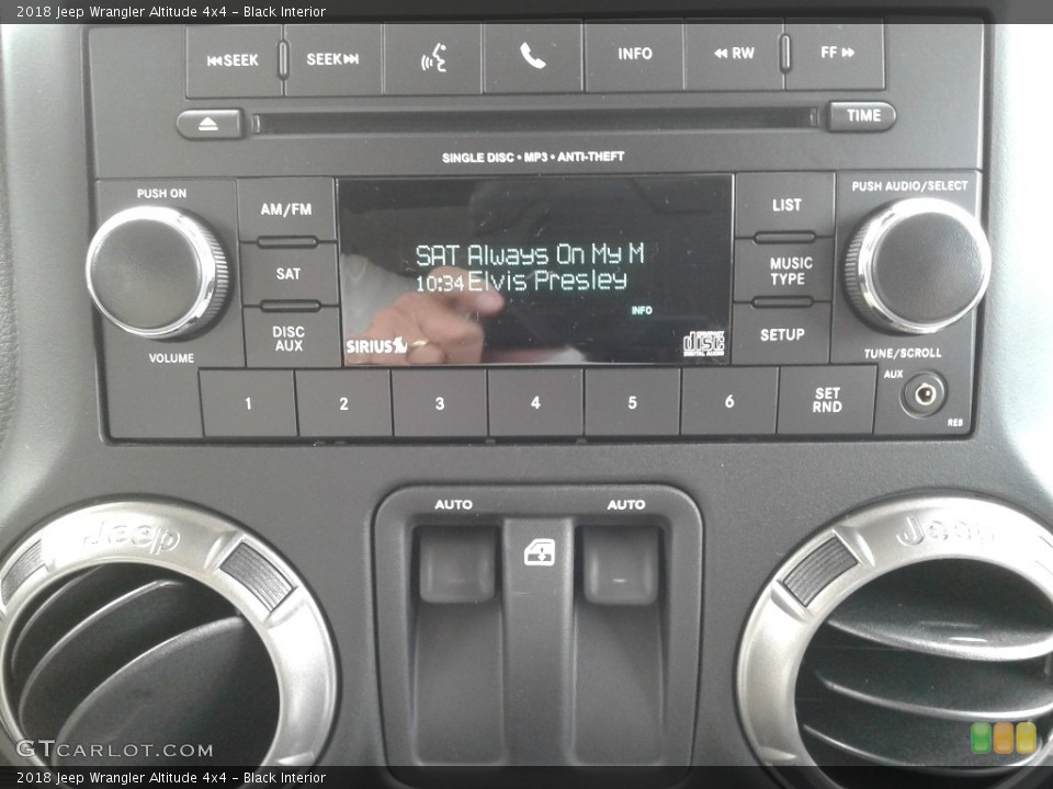 Black Interior Controls for the 2018 Jeep Wrangler Altitude 4x4 #125634381