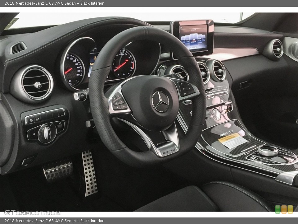 Black Interior Dashboard for the 2018 Mercedes-Benz C 63 AMG Sedan #125641899