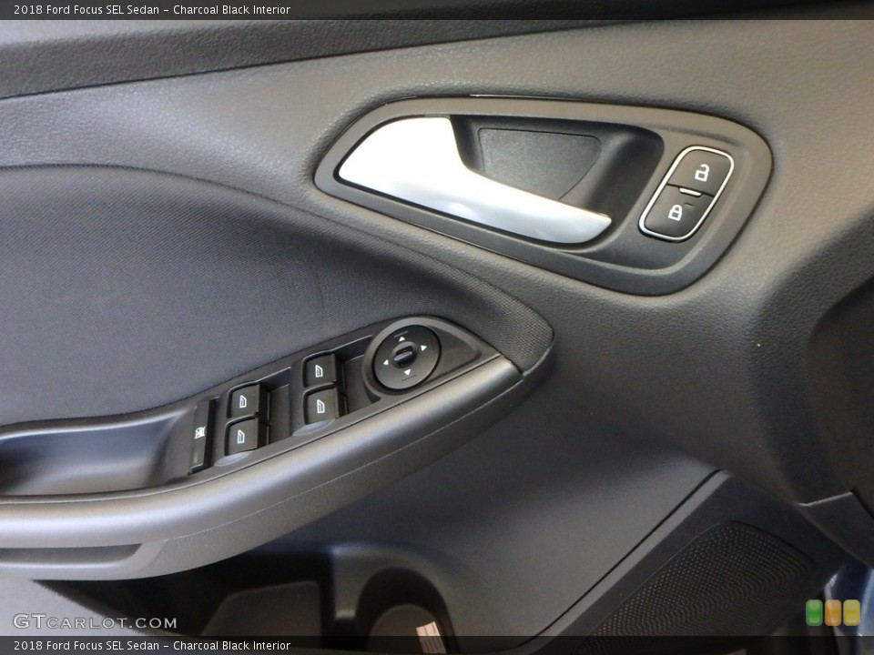 Charcoal Black Interior Door Panel for the 2018 Ford Focus SEL Sedan #126224914