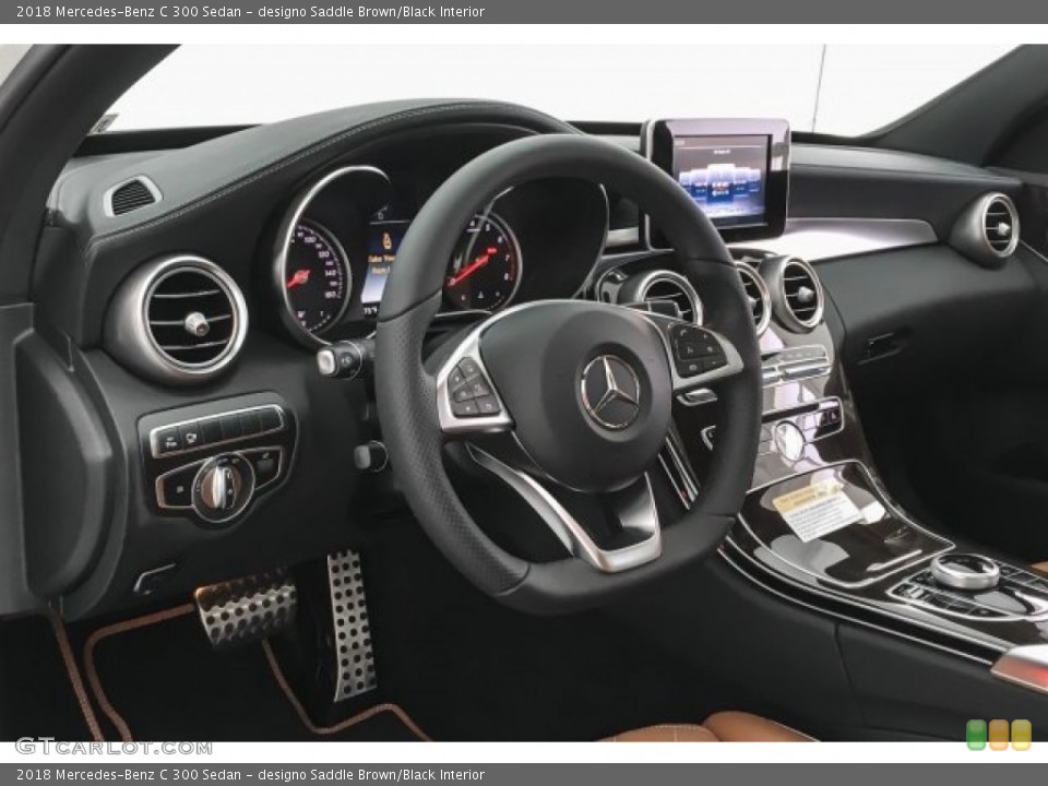 designo Saddle Brown/Black Interior Dashboard for the 2018 Mercedes-Benz C 300 Sedan #126642806