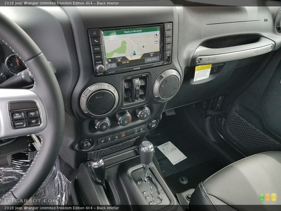 Black Interior Controls for the 2018 Jeep Wrangler Unlimited Freedom Edition 4X4 #126796520
