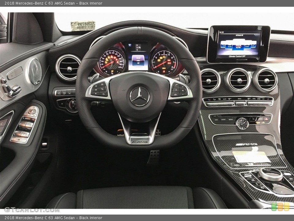 Black Interior Dashboard for the 2018 Mercedes-Benz C 63 AMG Sedan #126838577