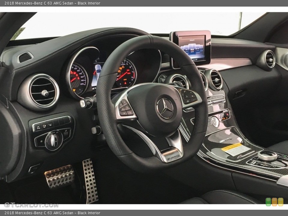 Black Interior Dashboard for the 2018 Mercedes-Benz C 63 AMG Sedan #126838973