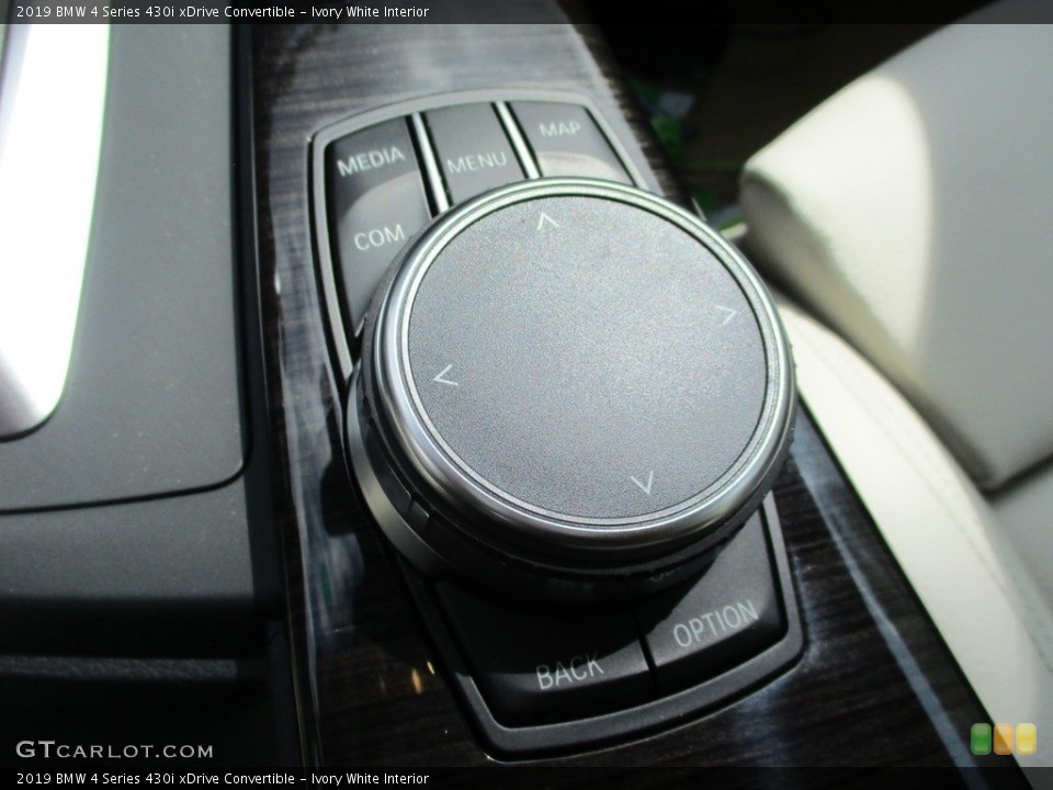 Ivory White Interior Controls for the 2019 BMW 4 Series 430i xDrive Convertible #127231612
