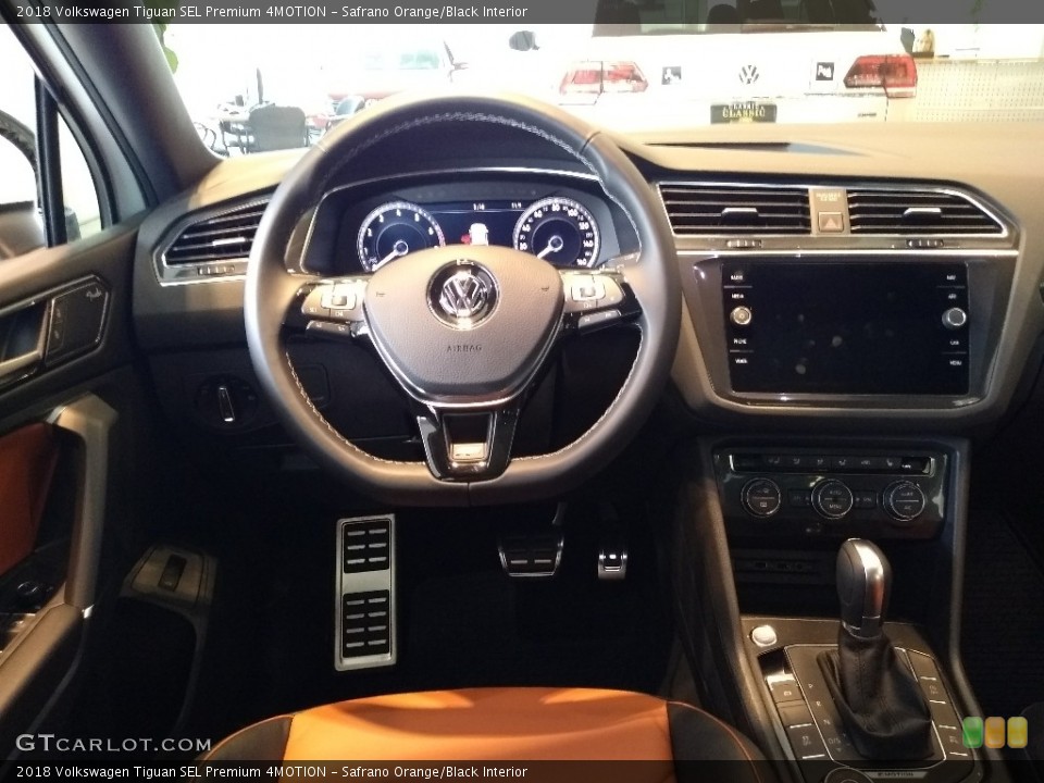 Safrano Orange/Black Interior Dashboard for the 2018 Volkswagen Tiguan SEL Premium 4MOTION #127318178