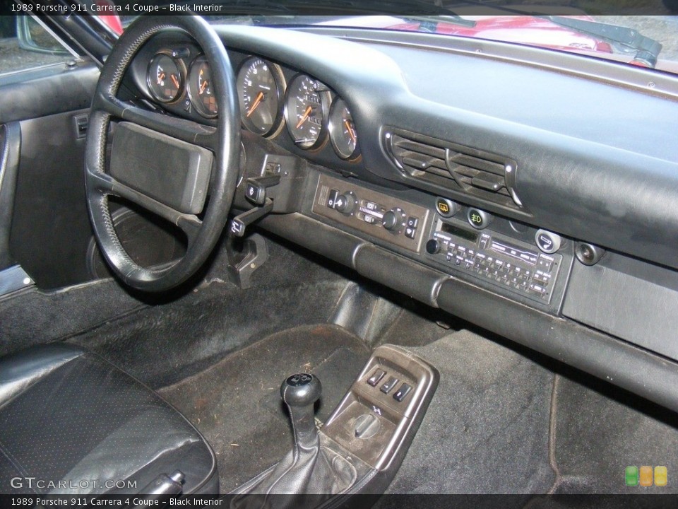 Black Interior Dashboard for the 1989 Porsche 911 Carrera 4 Coupe #127602915