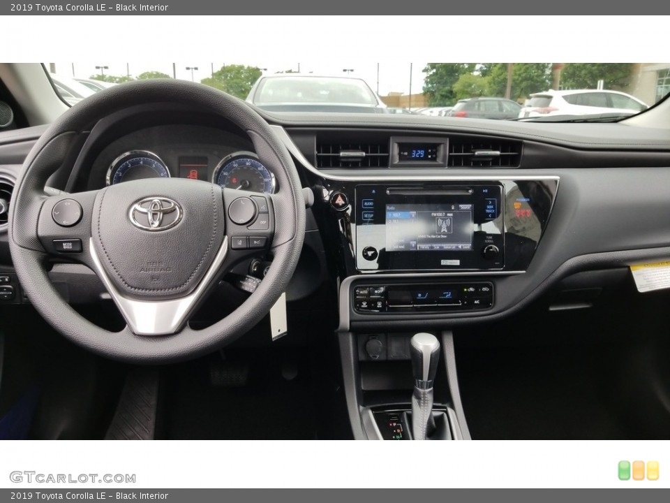 Black Interior Dashboard for the 2019 Toyota Corolla LE #127678437