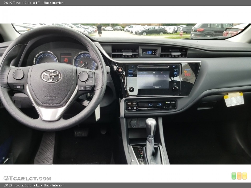 Black Interior Dashboard for the 2019 Toyota Corolla LE #127678809