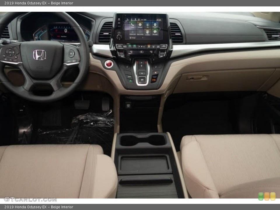 Beige Interior Dashboard for the 2019 Honda Odyssey EX #127725823