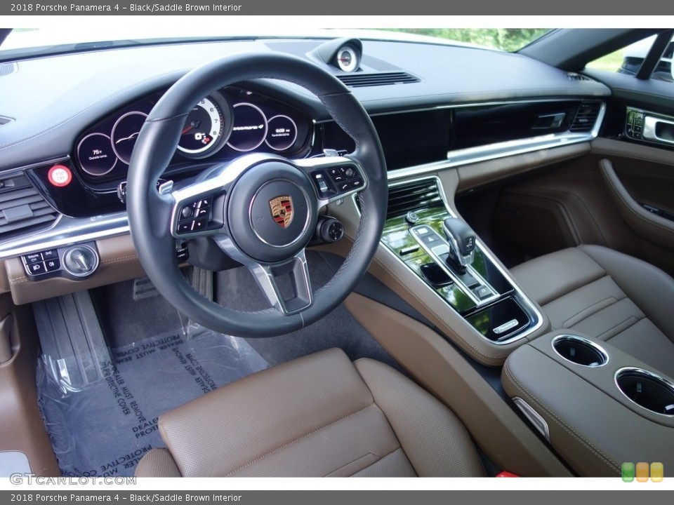 Black/Saddle Brown Interior Photo for the 2018 Porsche Panamera 4 #127977221