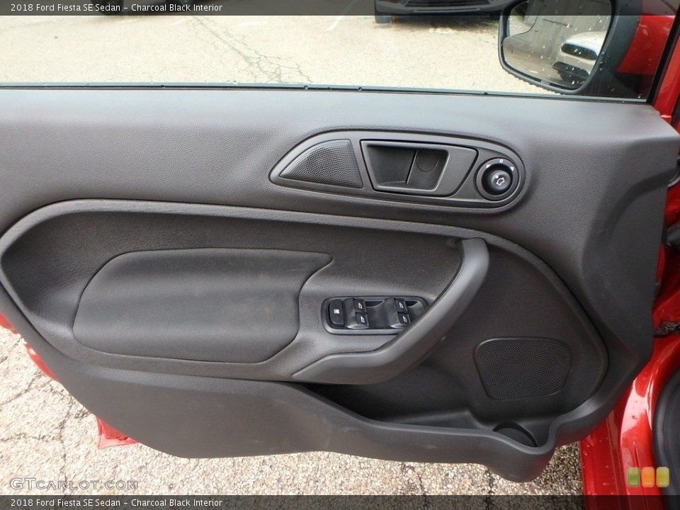 Charcoal Black Interior Door Panel for the 2018 Ford Fiesta SE Sedan #128136301