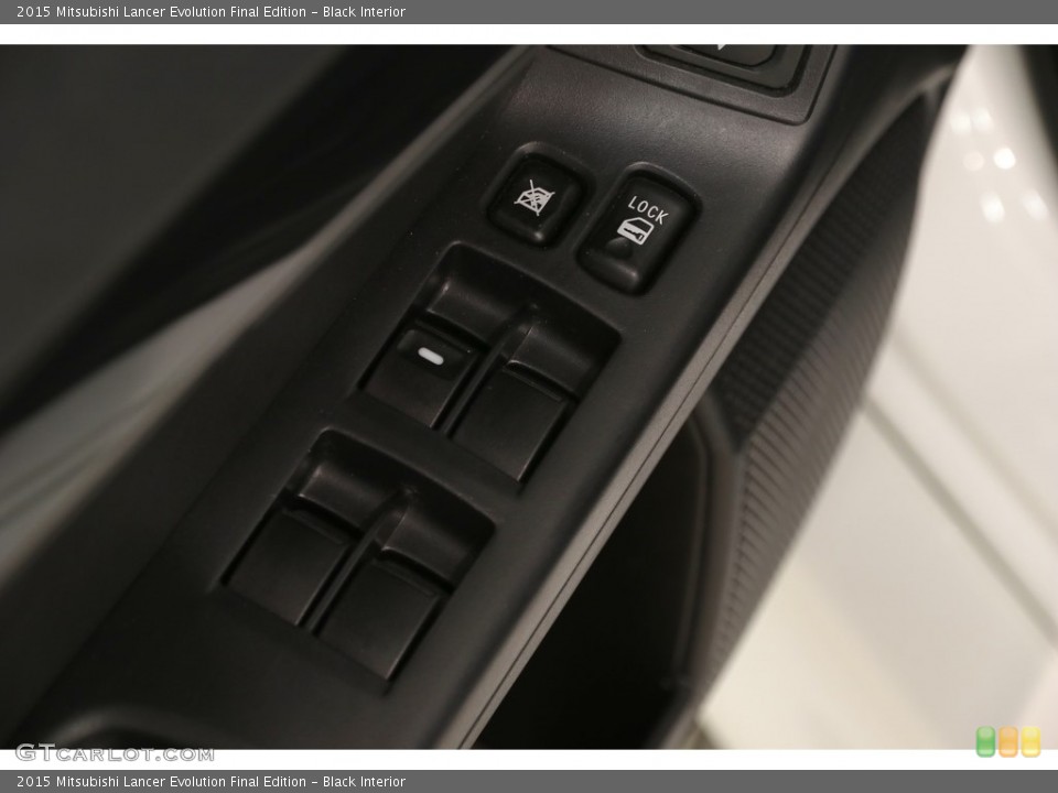 Black Interior Controls for the 2015 Mitsubishi Lancer Evolution Final Edition #128210658