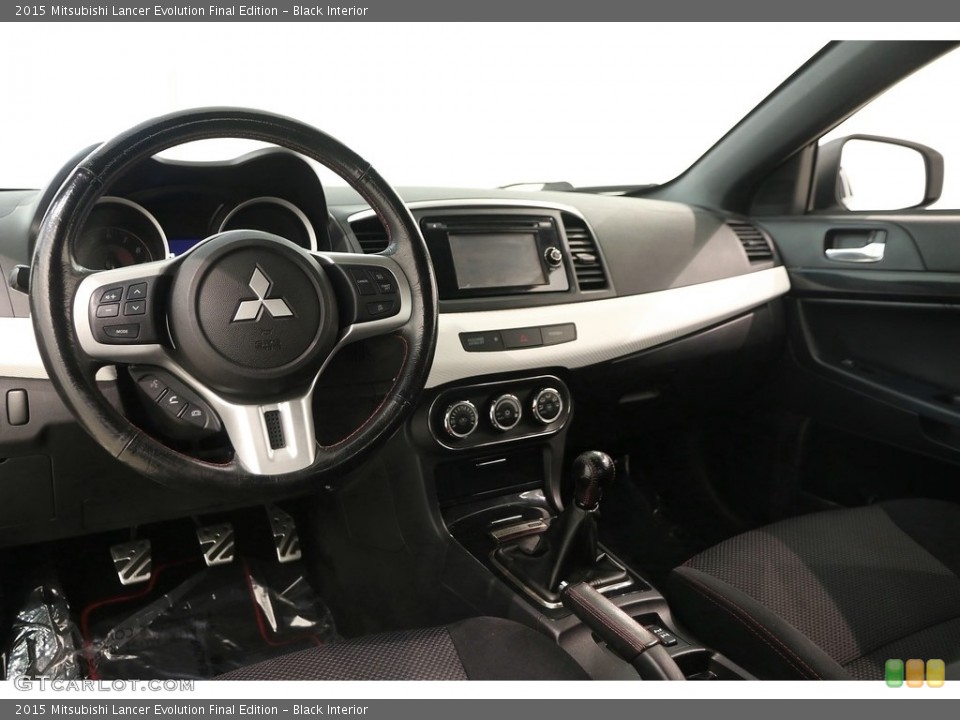 Black Interior Dashboard for the 2015 Mitsubishi Lancer Evolution Final Edition #128210664