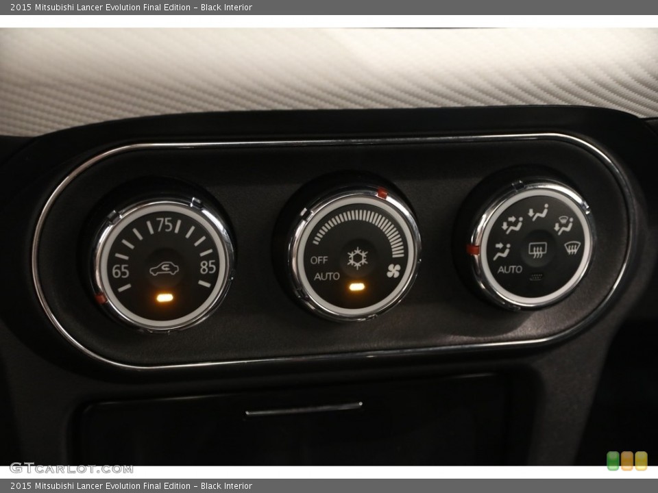 Black Interior Controls for the 2015 Mitsubishi Lancer Evolution Final Edition #128210718
