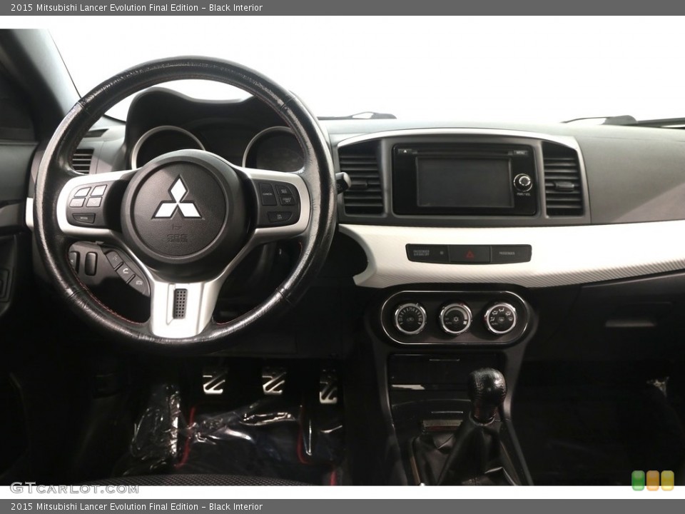 Black Interior Dashboard for the 2015 Mitsubishi Lancer Evolution Final Edition #128210754